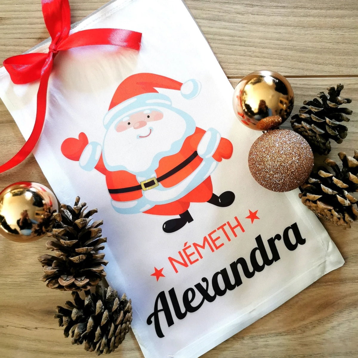 Geantă personalizată de Moș Crăciun cu o figurină la alegere